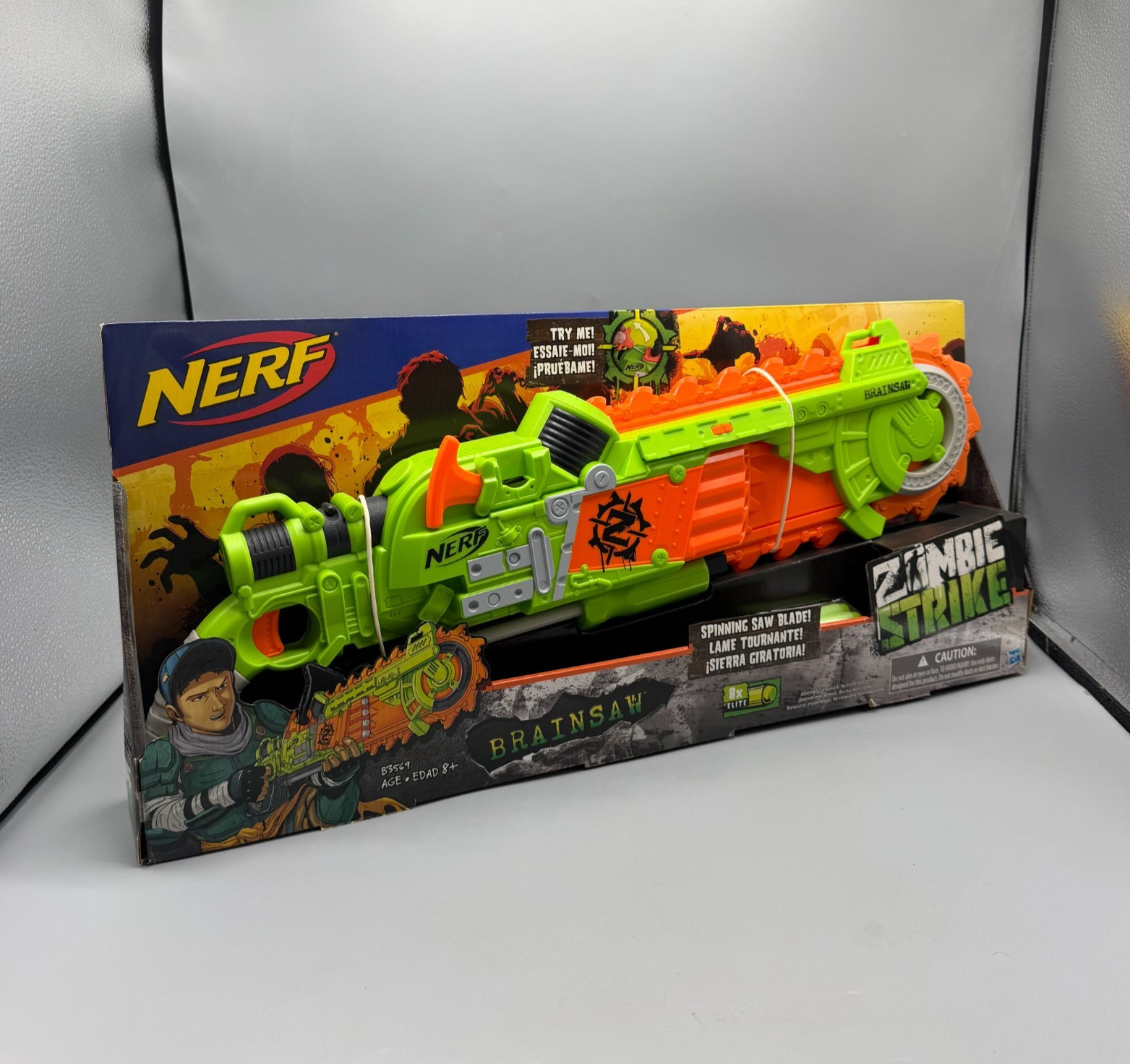 Nerf Zombie Strike Brainsaw Chainsaw Pump Action Dart Blaster Gun New