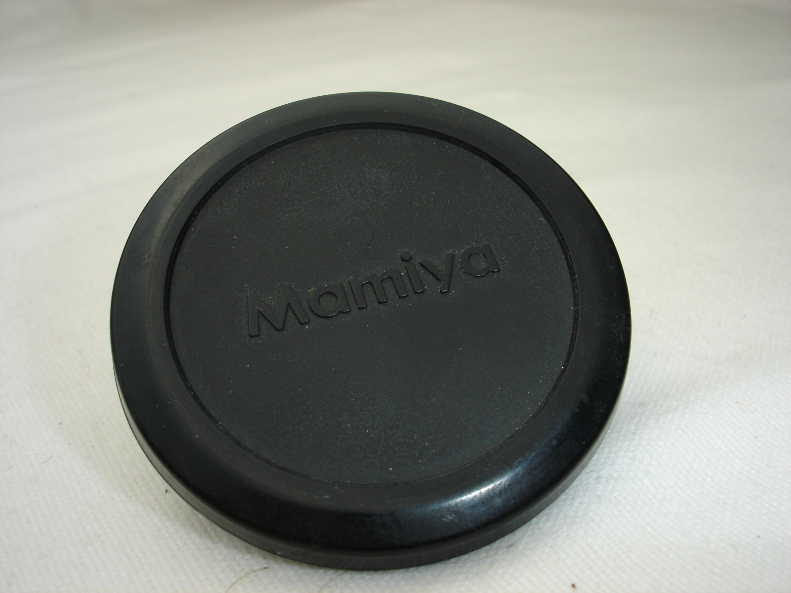 MAMIYA 51mm lens cap for lenses with 49mm size filter thread , Pictured model
