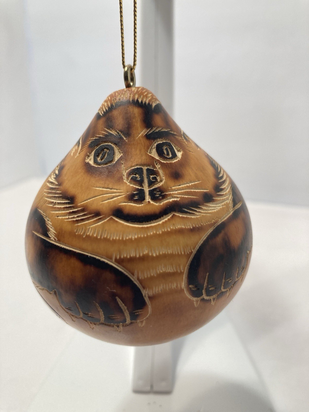 tiger/cat hand carved gourd ornament Peru