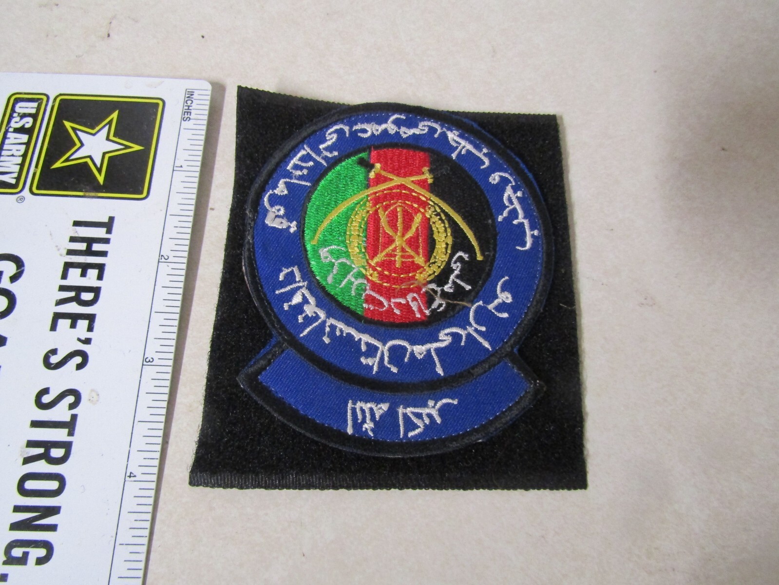 MILITARY PATCH HOOK AND LOOP THEATRE MADE AFGHANISTAN ARABIC WRITING BLUE CROSSE
