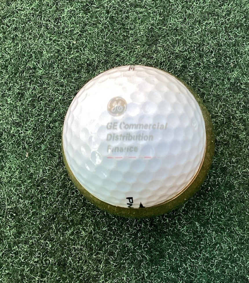 GE Commercial Distribution Finance Logo Display Golf Ball Slightly Faded