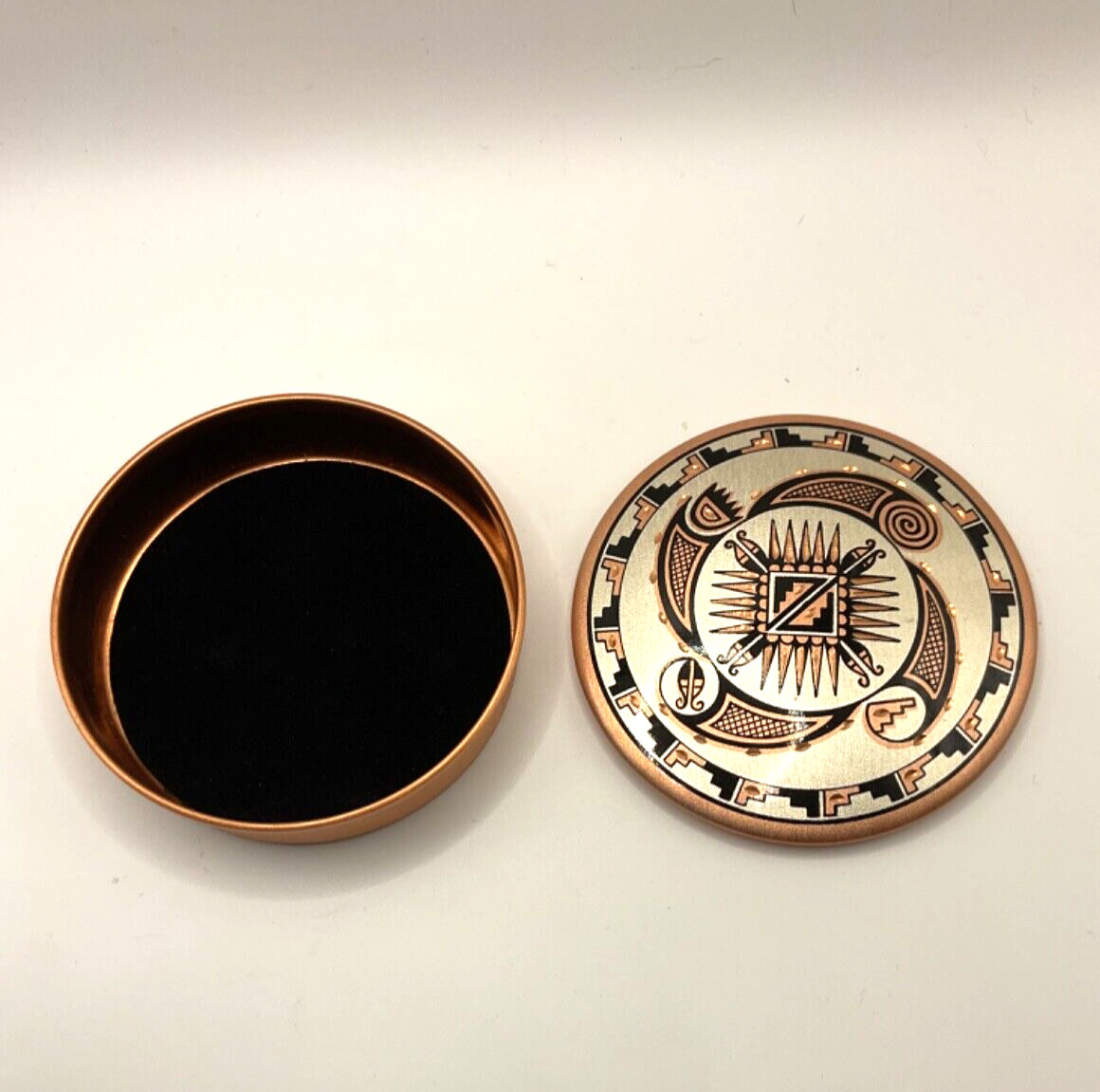 Copper lidded box from Greece 4” in diameter.