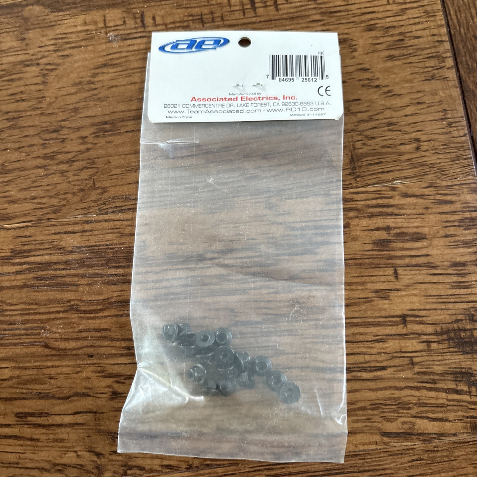 Team Associated 25612 - M3 Locknut, Flange, Black (10)
