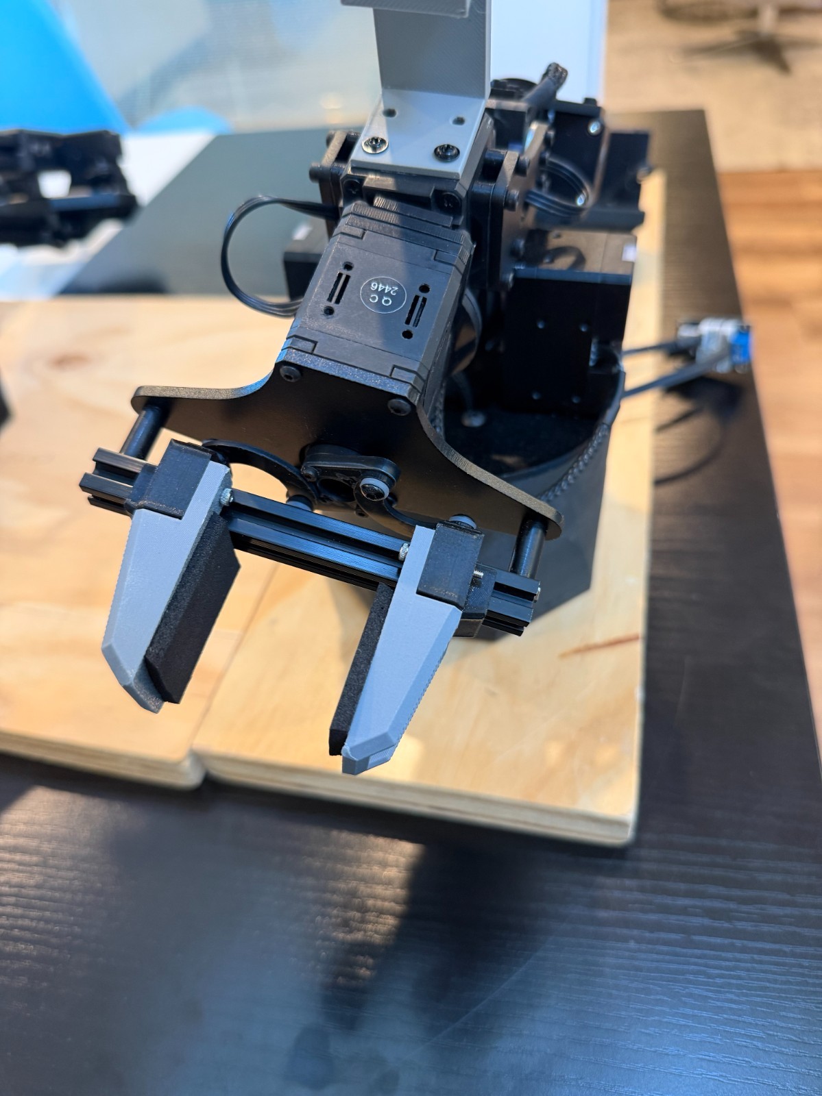 2 * Trossen Widowx 250s with power source, u2d2 boards, grippers, wooden boards