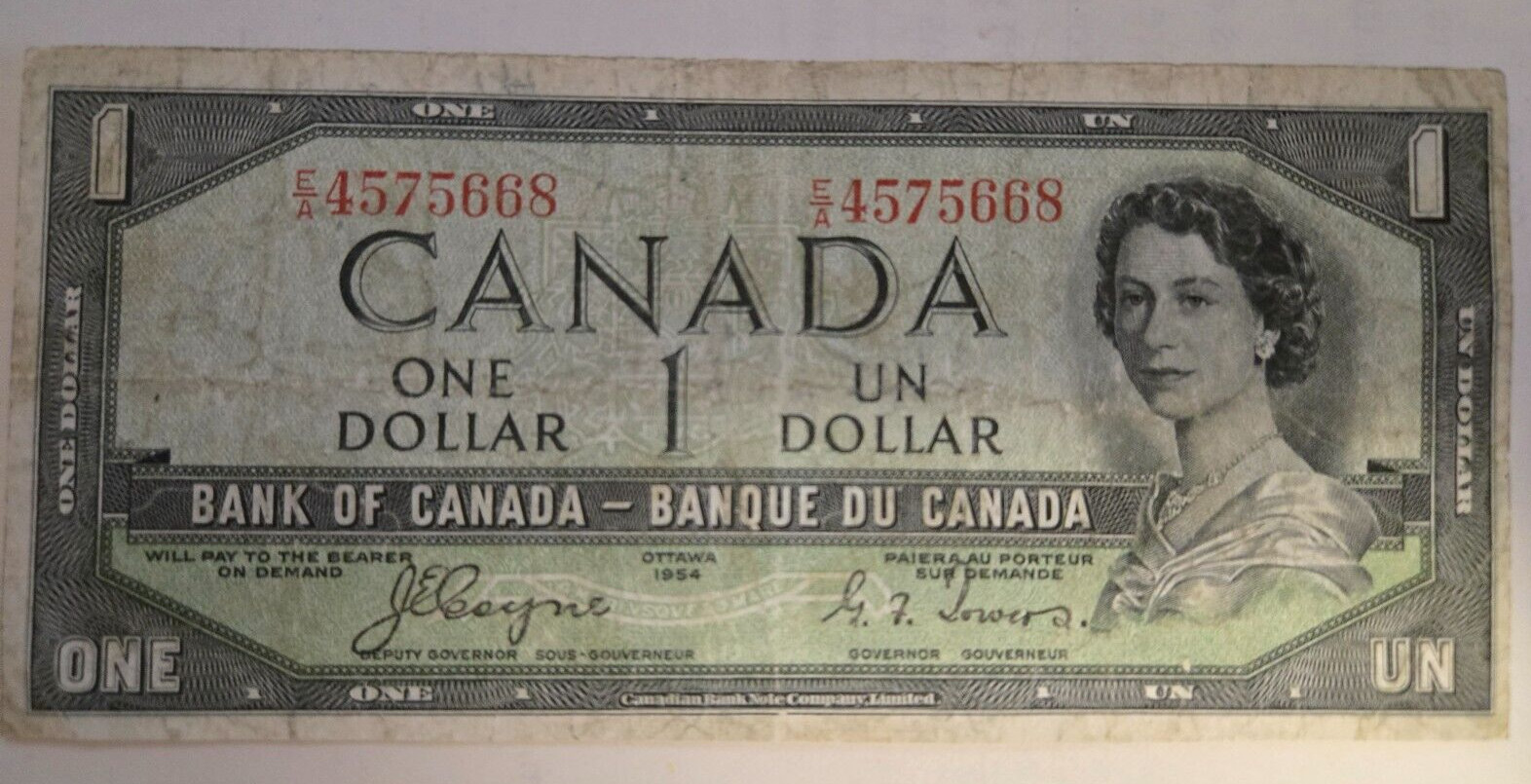 1954 Canada $1 HRH Queen Elizabeth II Devils Face E/A4575668 JEC/GFT Bank Note