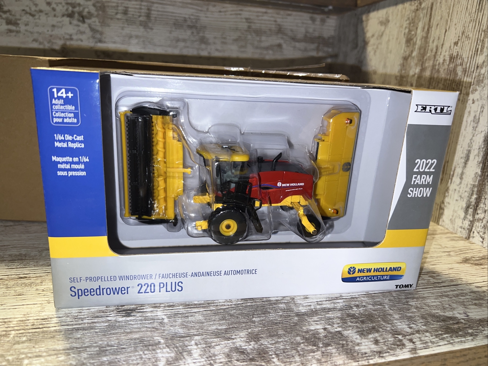 1/64th New Holland 220 Plus  Speedrower Windrower 2022 Farm Show Die-Cast