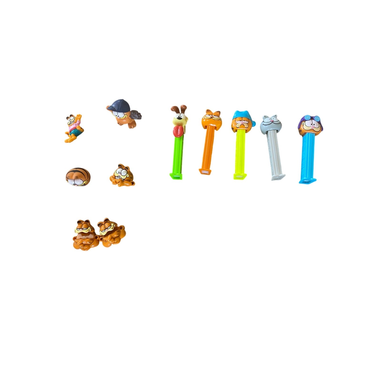 Garfield Lot of 11 Collectible Pez Dispensers And Shoelace Biters Figurines