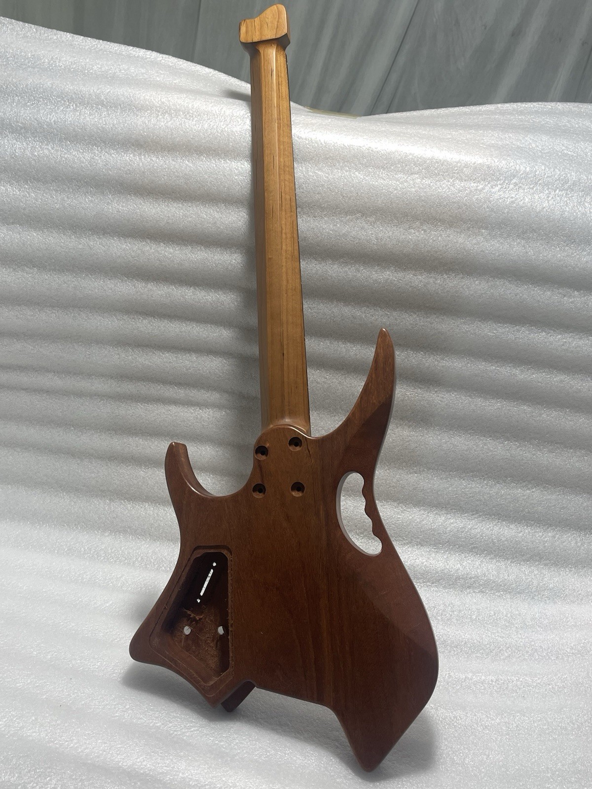 fanned frets 24frets Headless Electric guitar 1 piece Mahogany body T Outline，