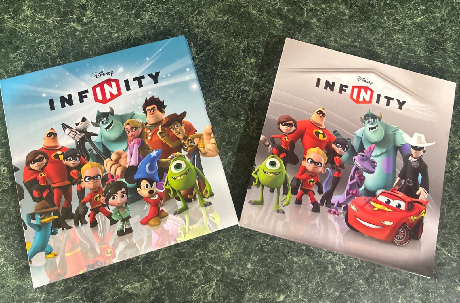 Disney Infinity 1.0 Strategy Guide Books Lot of 2 Total Of 25