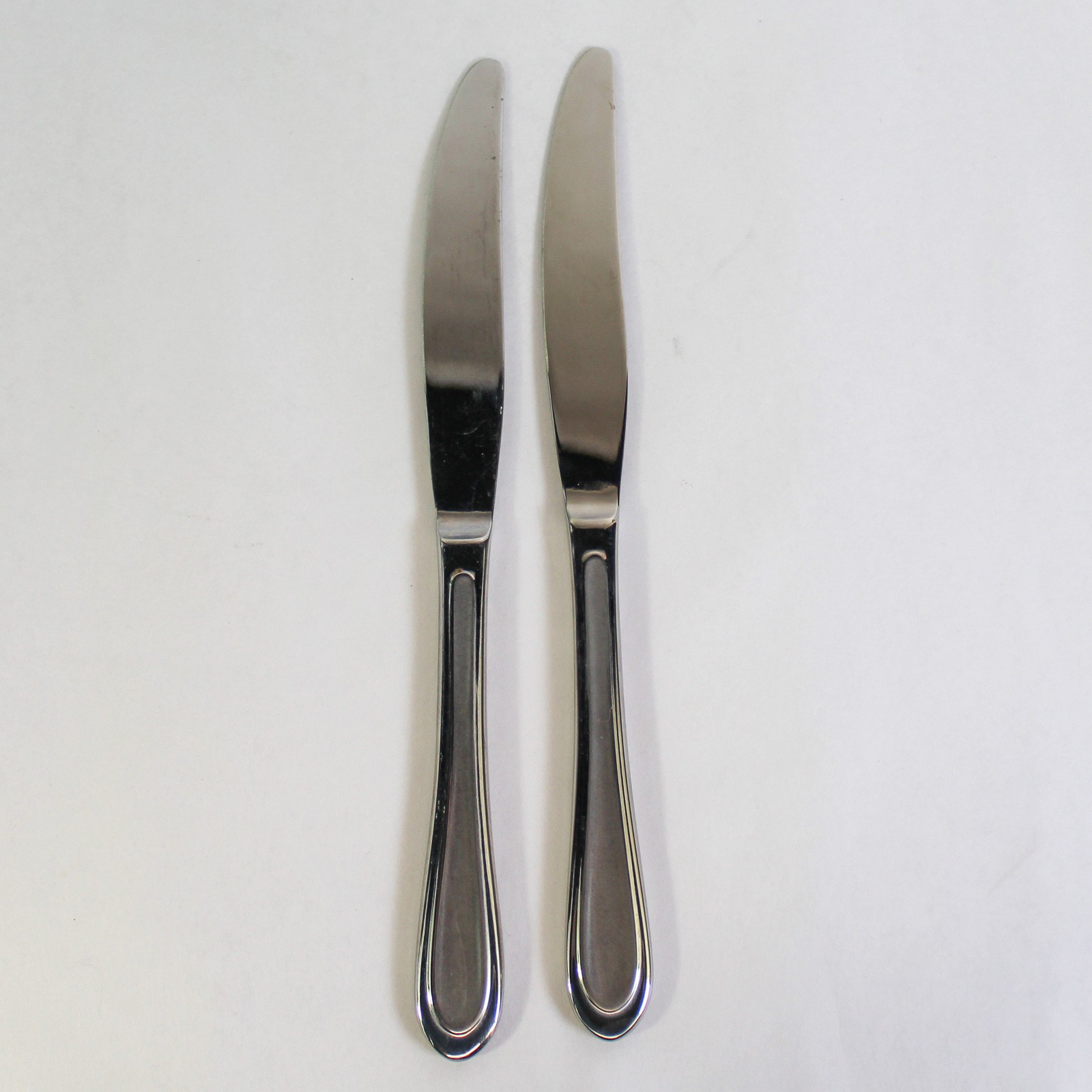 Lot of 2 Oneida Ivory Stainless French Hollow Dinner Knives - Good Condition