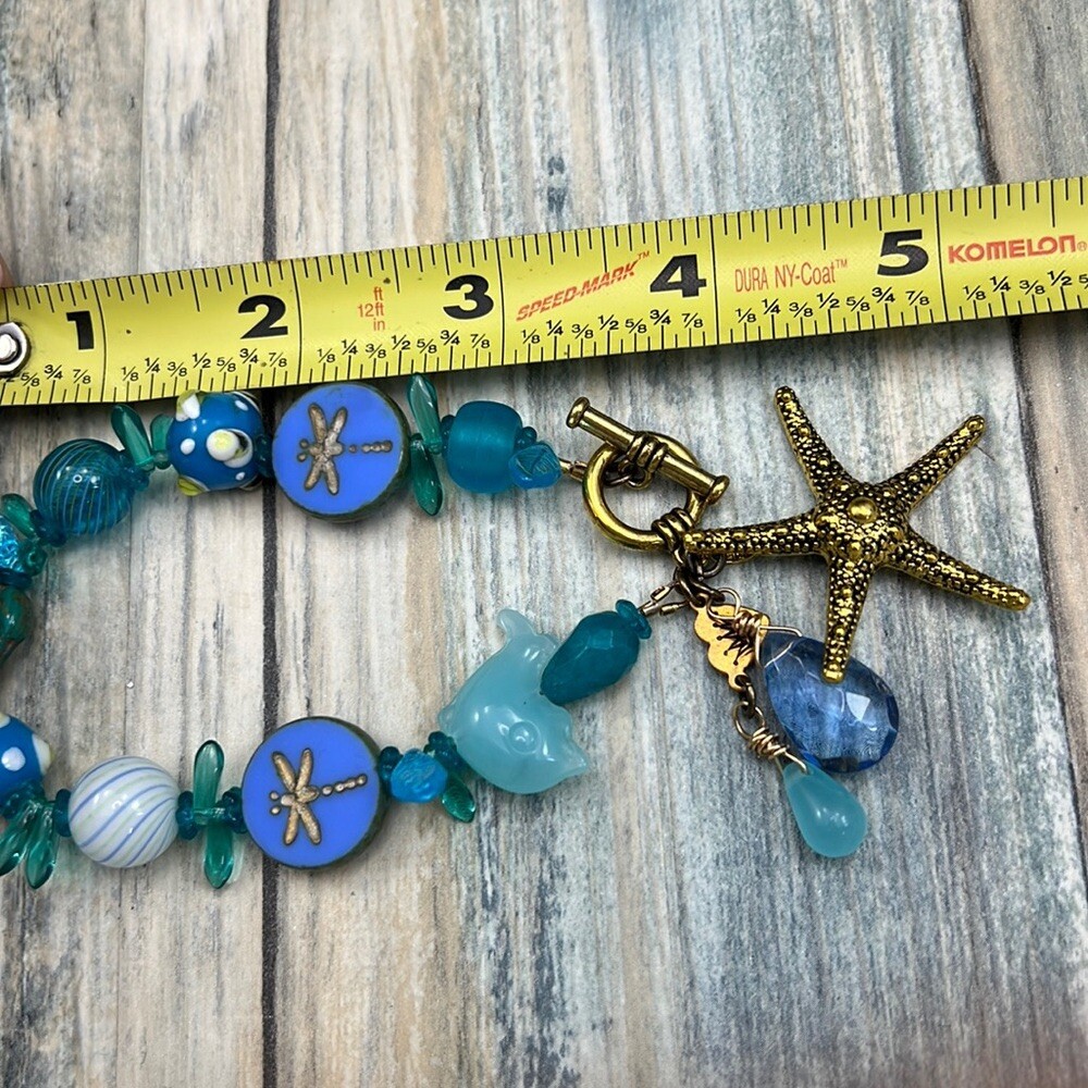 Adorned Crown Assemblage beaches & butterflies dragonfly starfish bracelet