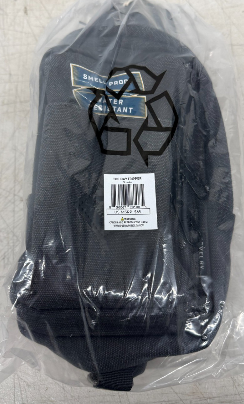 REVELRY DAYTRIPPER SLING PACK 4.8L ASH BRAND NEW FACTORY SEALED SMOKE COLOR!!!!!