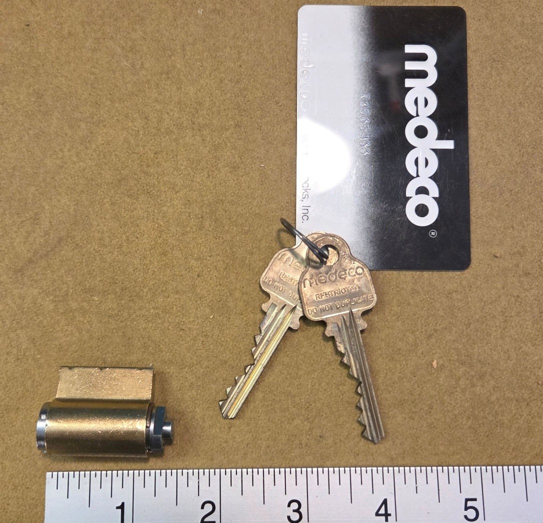 Medeco KIK cylinder with 2 working keys,  part no. 510100 - Tested good