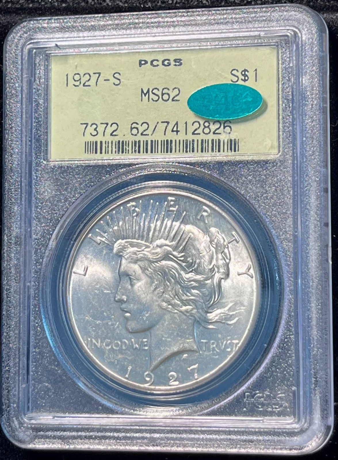 1927-s Peace Dollar graded PCGS MS62 in an Old Green Holder with a CAC sticker