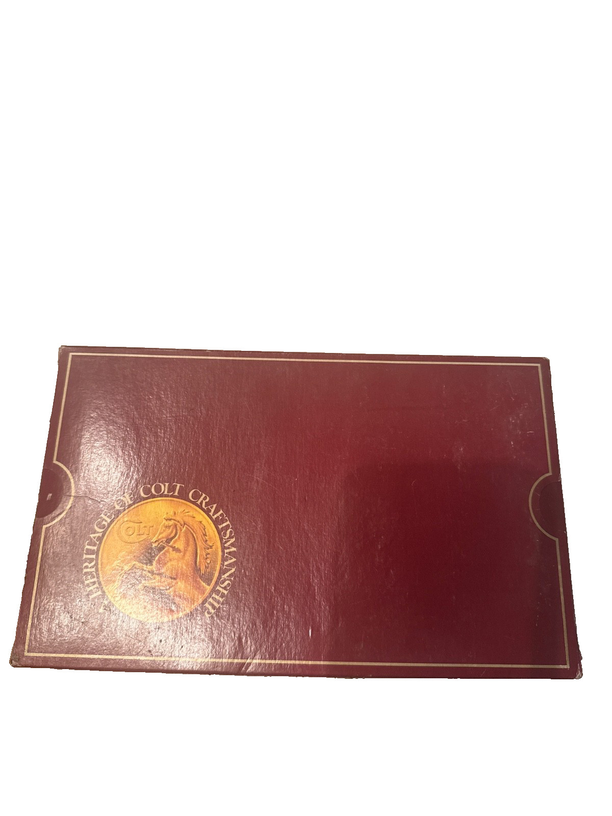 Colt handgun box, specifically identified as a maroon 150th-anniversary box