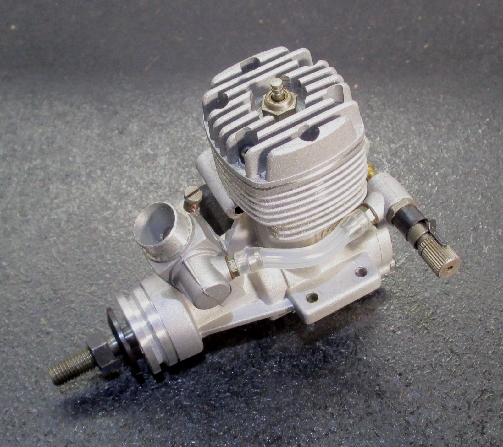O.S. MAX-25FX 4.07cc 2-Stroke Glow Engine Includes muffler; used for RC airplane