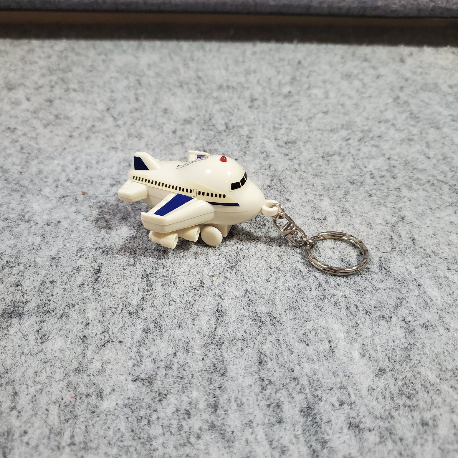Finova Promotional Airplane Keychain with Sounds and Lights