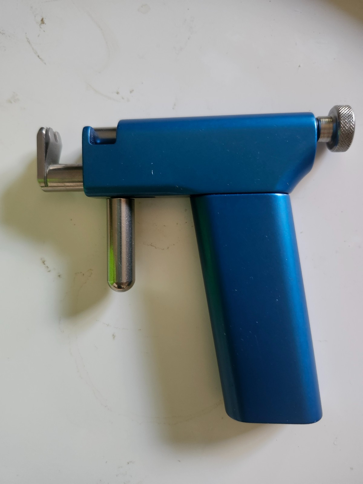 ear piercing system; 2 guns, 50+ pairs earrings. Older model guns.