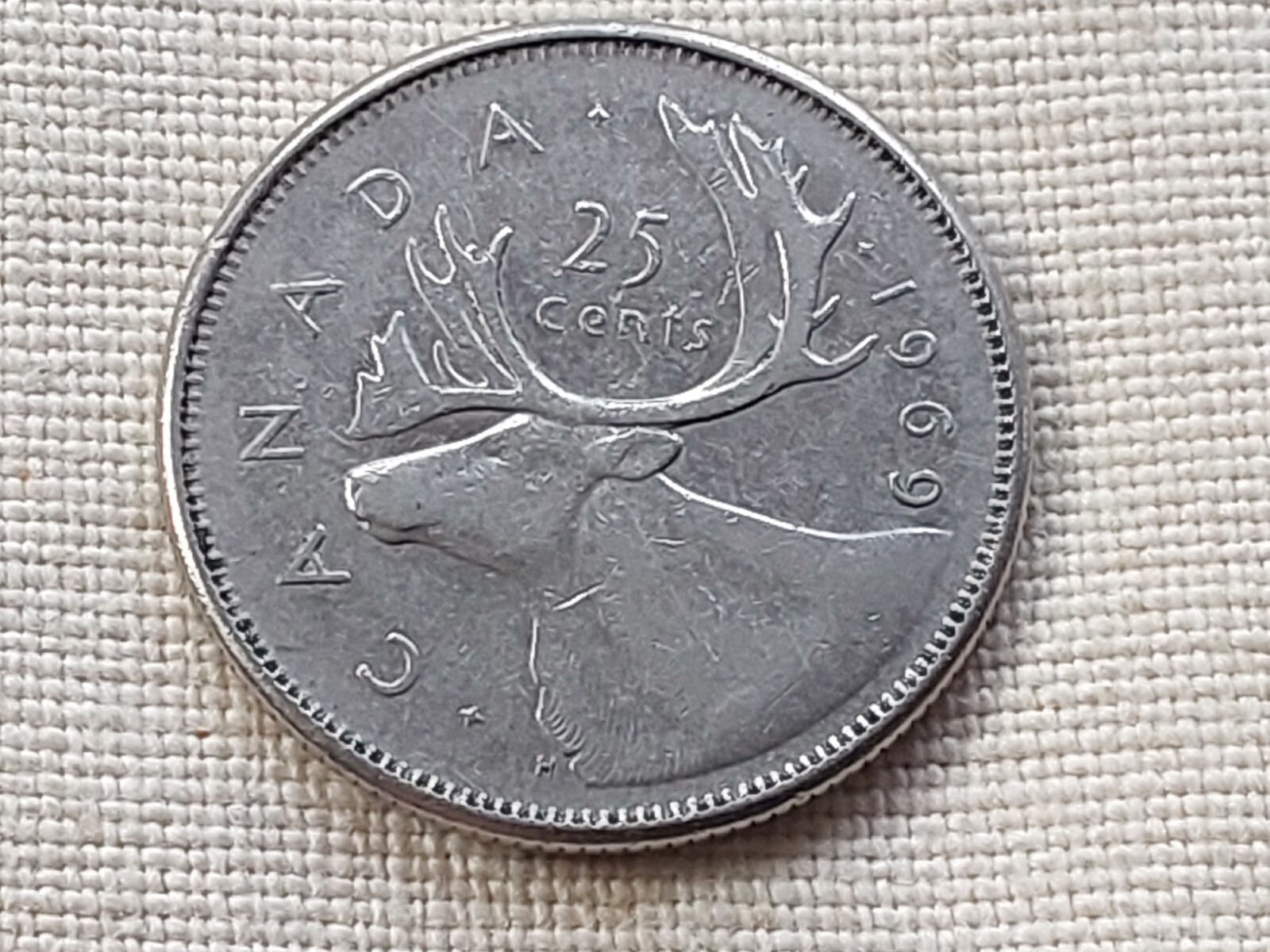 1969 Canada 25 cents coin