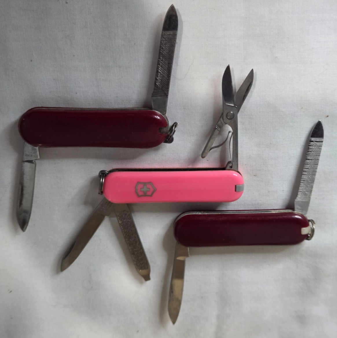 Lot of 3 Pocket Knifes Victorinox Swiss Army Pink Classic SD & 2 Utility Knifes