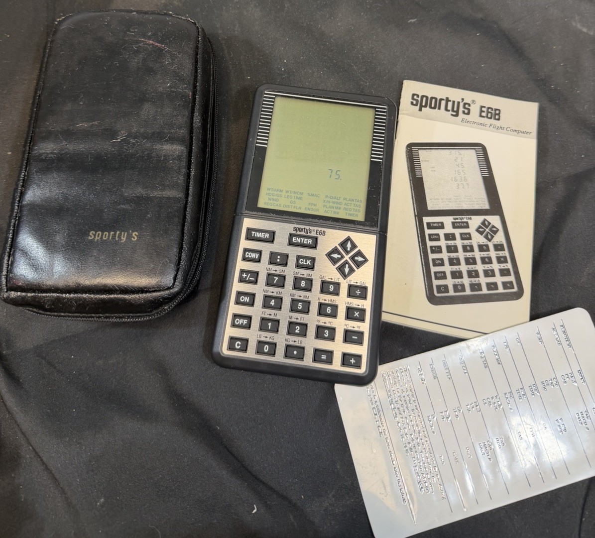 Sporty's E6B Electronic Flight Computer With Book And Pouch