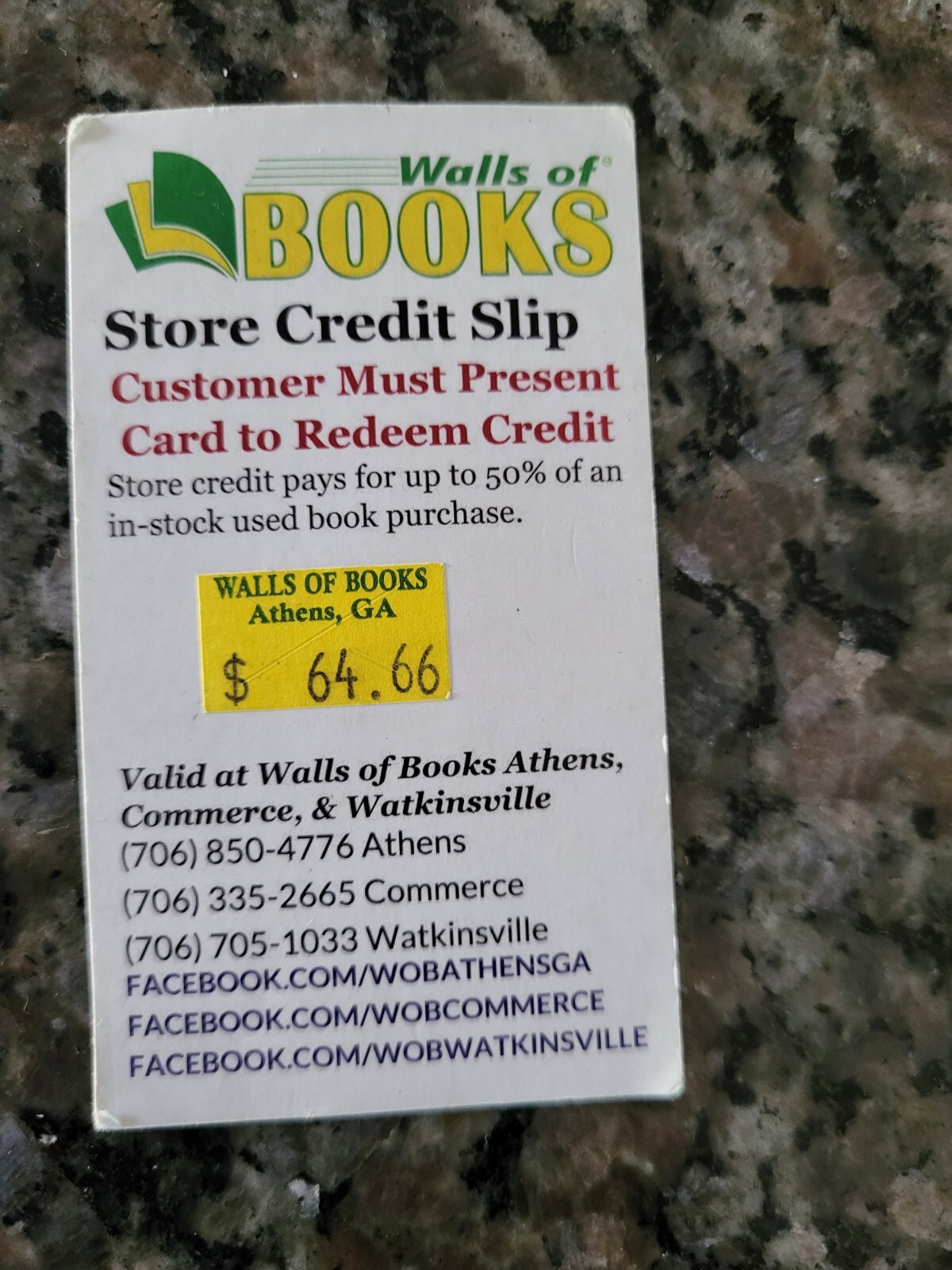 wall of books gift card store credit