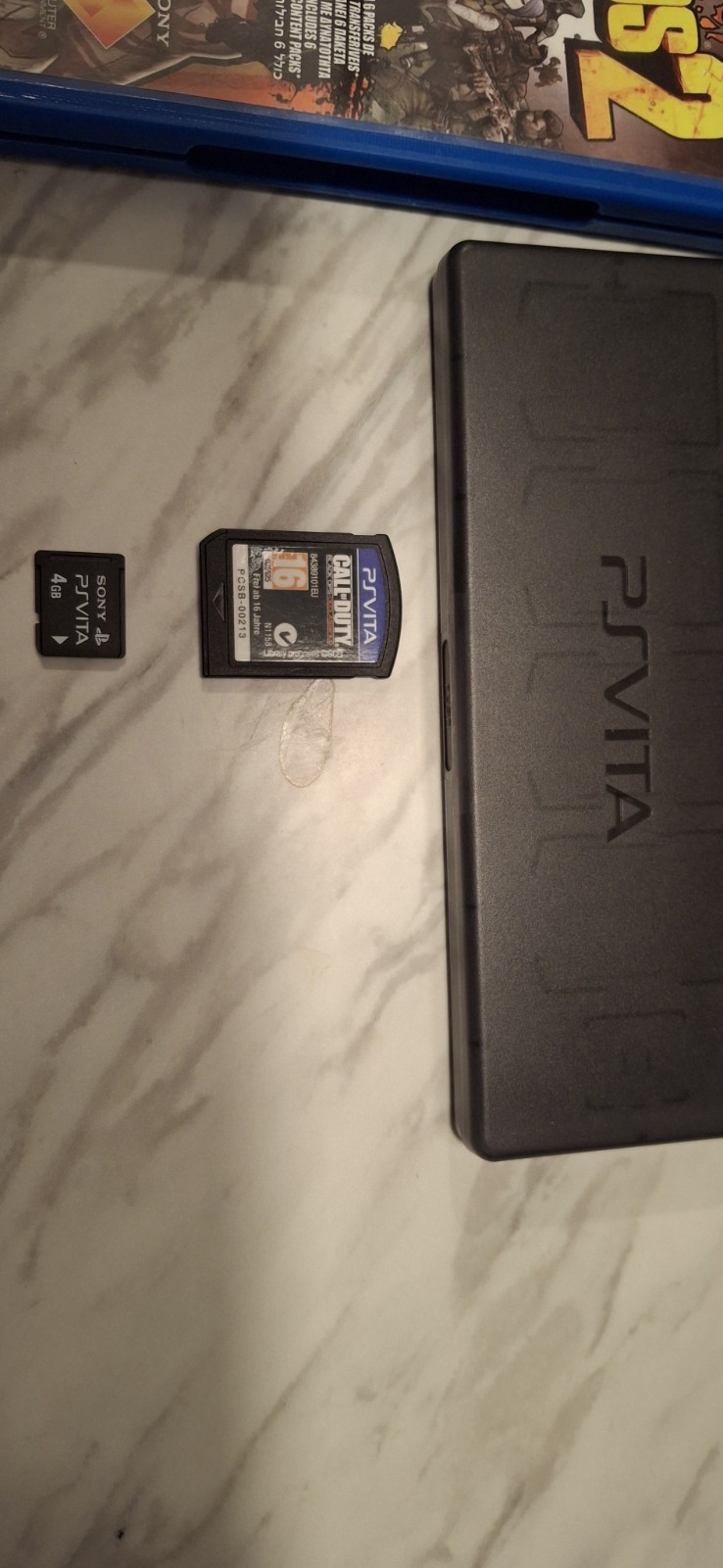 Psvita Game Bundle, And A 4 Gb Memory Card + Game case.