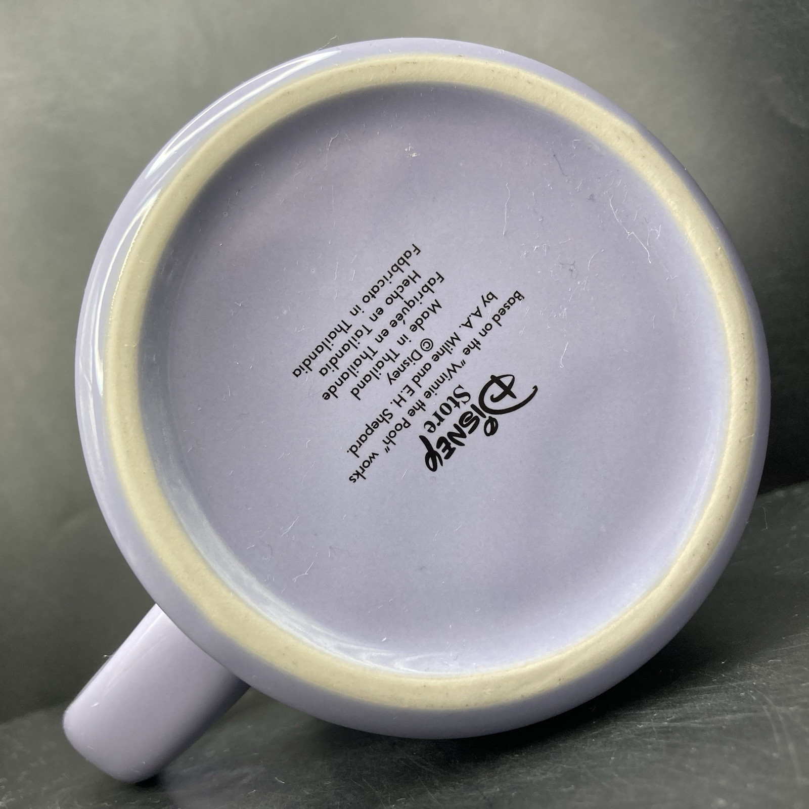 Disney Store Eeyore Bursting Through a Wall LARGE Purple Embossed Ceramic Mug