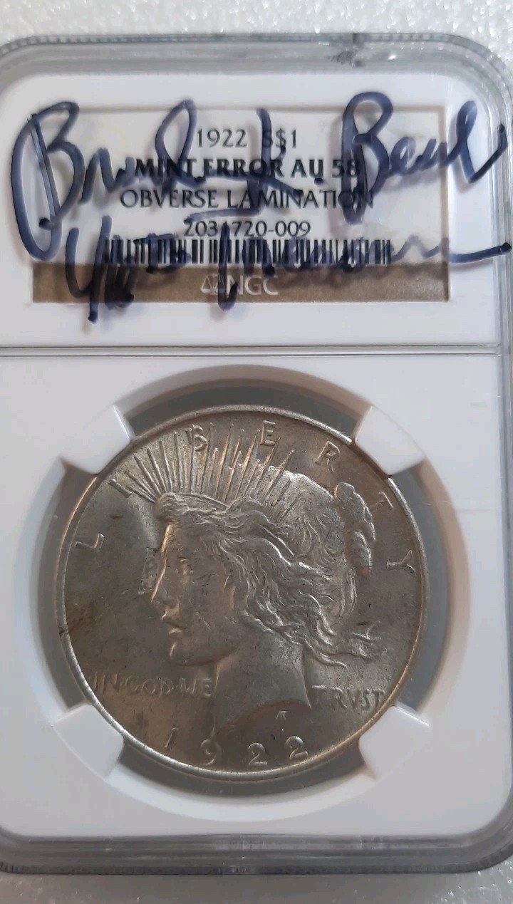 1922 Peace Dollar $1 Silver P Mint Error Obverse NGC AU58. 46th US Treasurer.