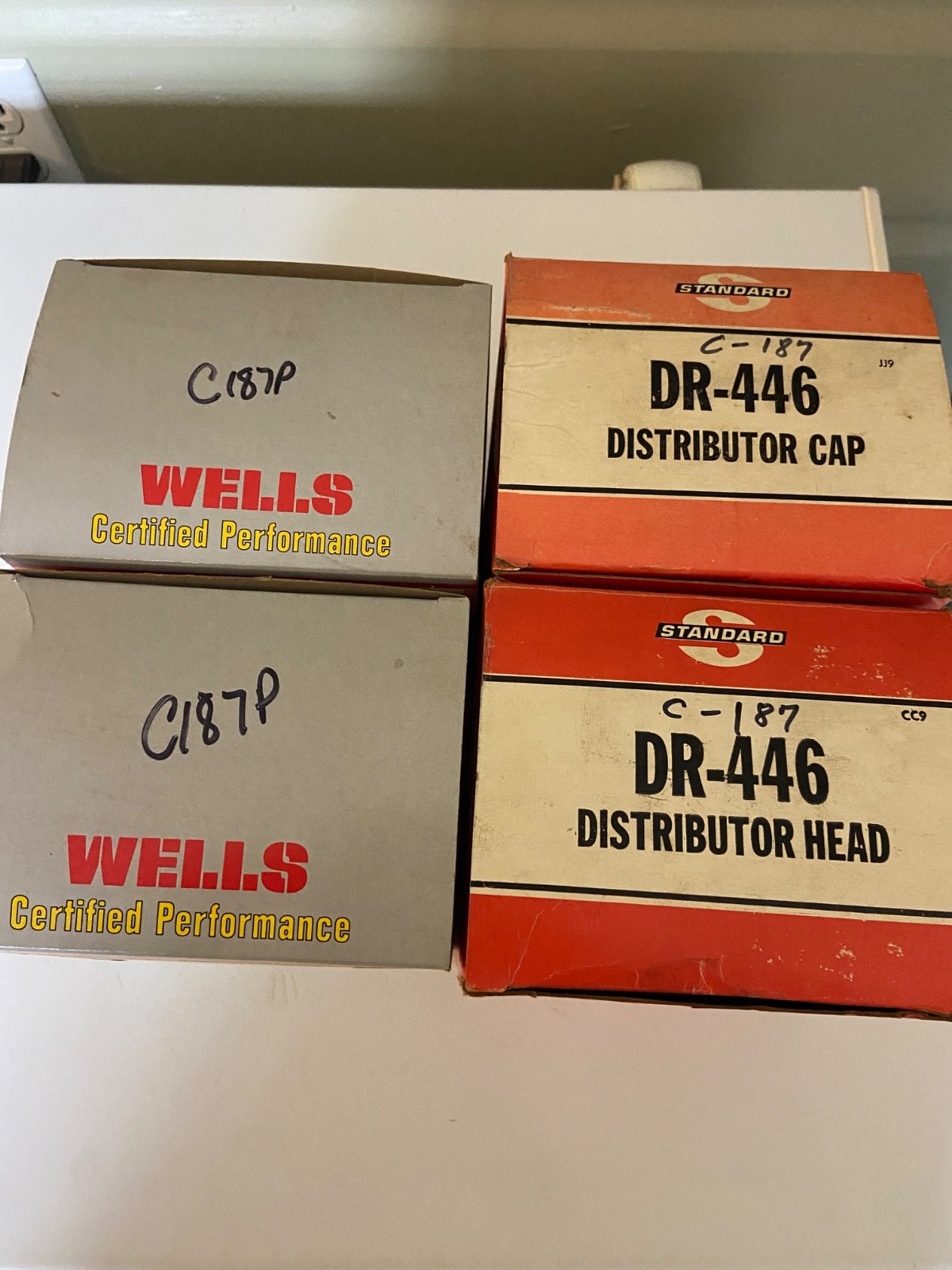 Lot of 4 DR-446 Distributor Caps – 2 Made in USA, 1 Standard, 1 Unbranded NOS