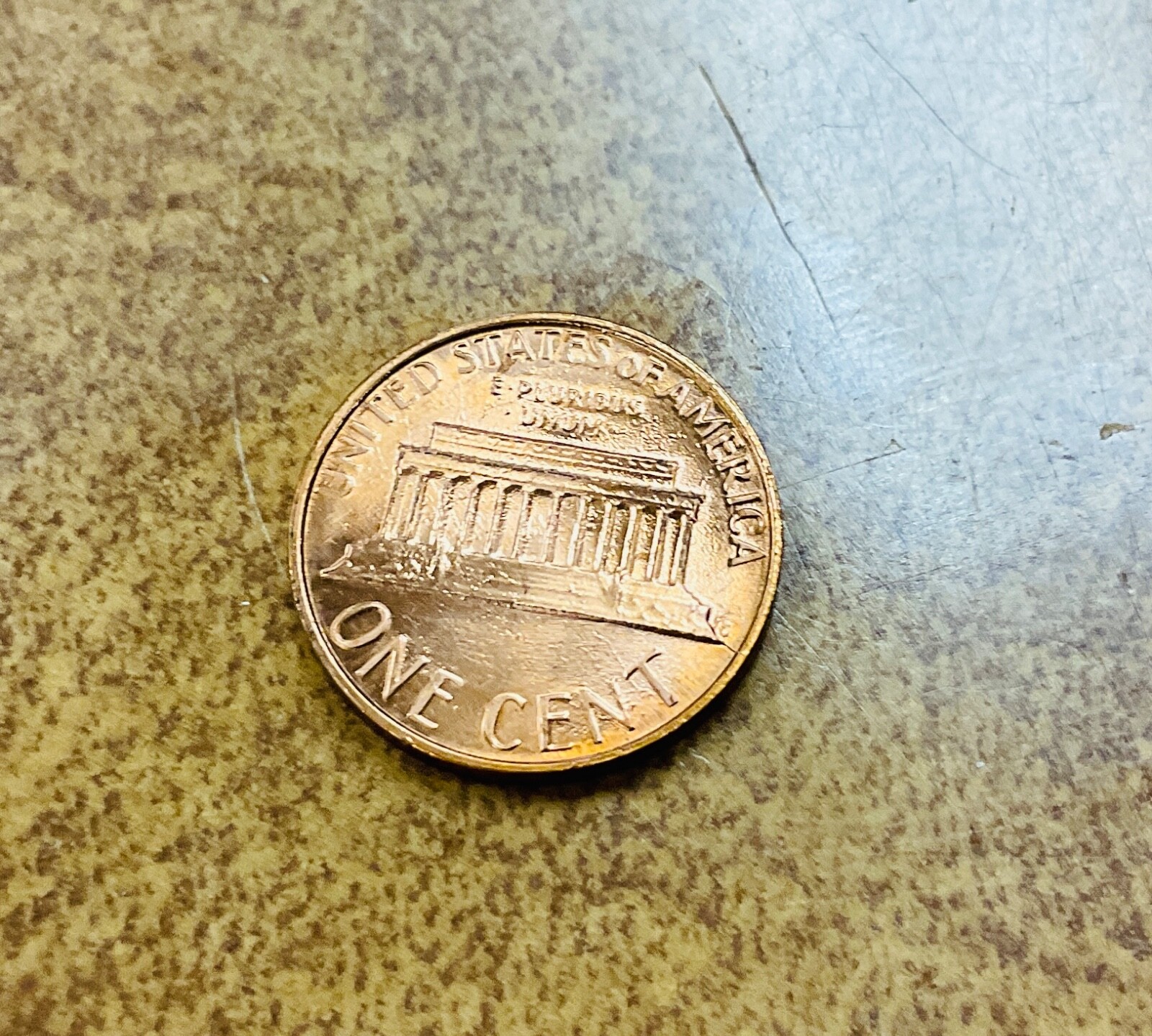 1983 Lincoln cent struck thru or die adjustment ERROR.