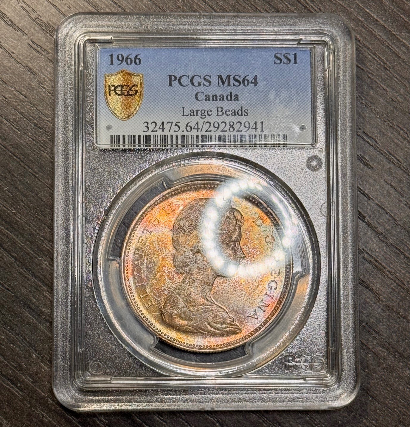 MS64 1966 $1 Canada Voyageur Silver Dollar, PCGS Trueview- Rainbow Toned
