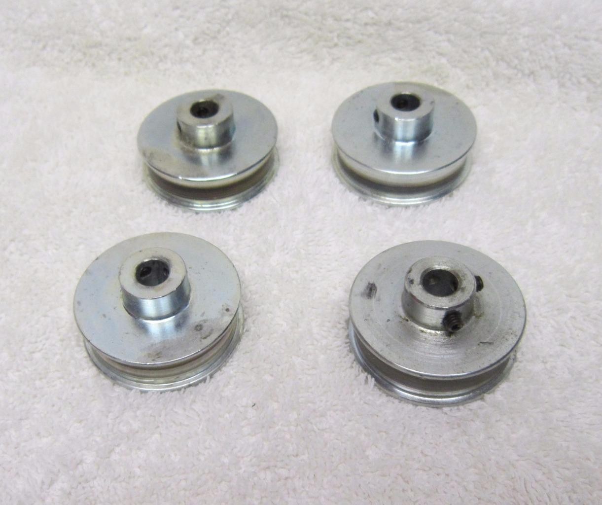 FOUR-1.50" STEEL DRIVE FLAT BELT PULLEYS-.375 WIDE WITH .312" CENTER W/SET SCREW