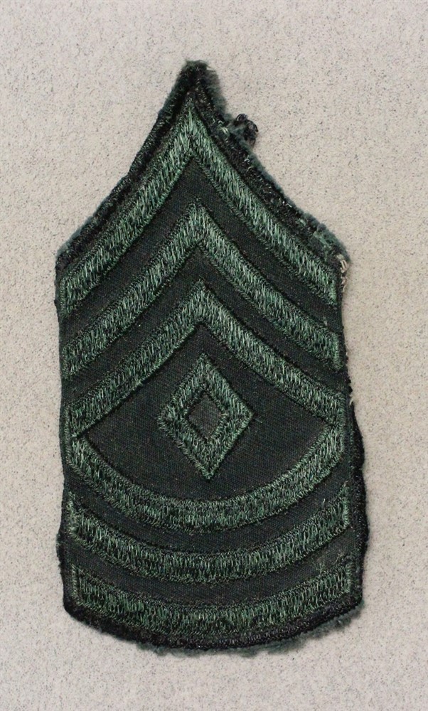 Army Chevron 1721: First Sergeant, single - subdued (dyed black), VN era