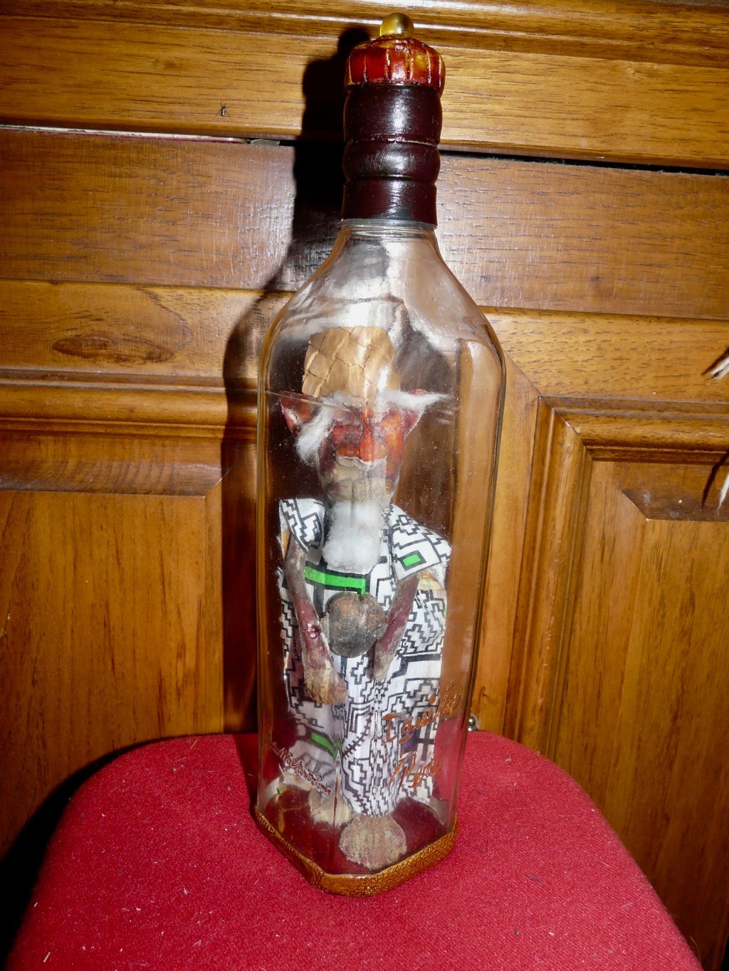 PERU AMAZON MYTHOLOGICAL FOREST CREATURE  CHULLACHAQUI CARVING IN BOTTLE