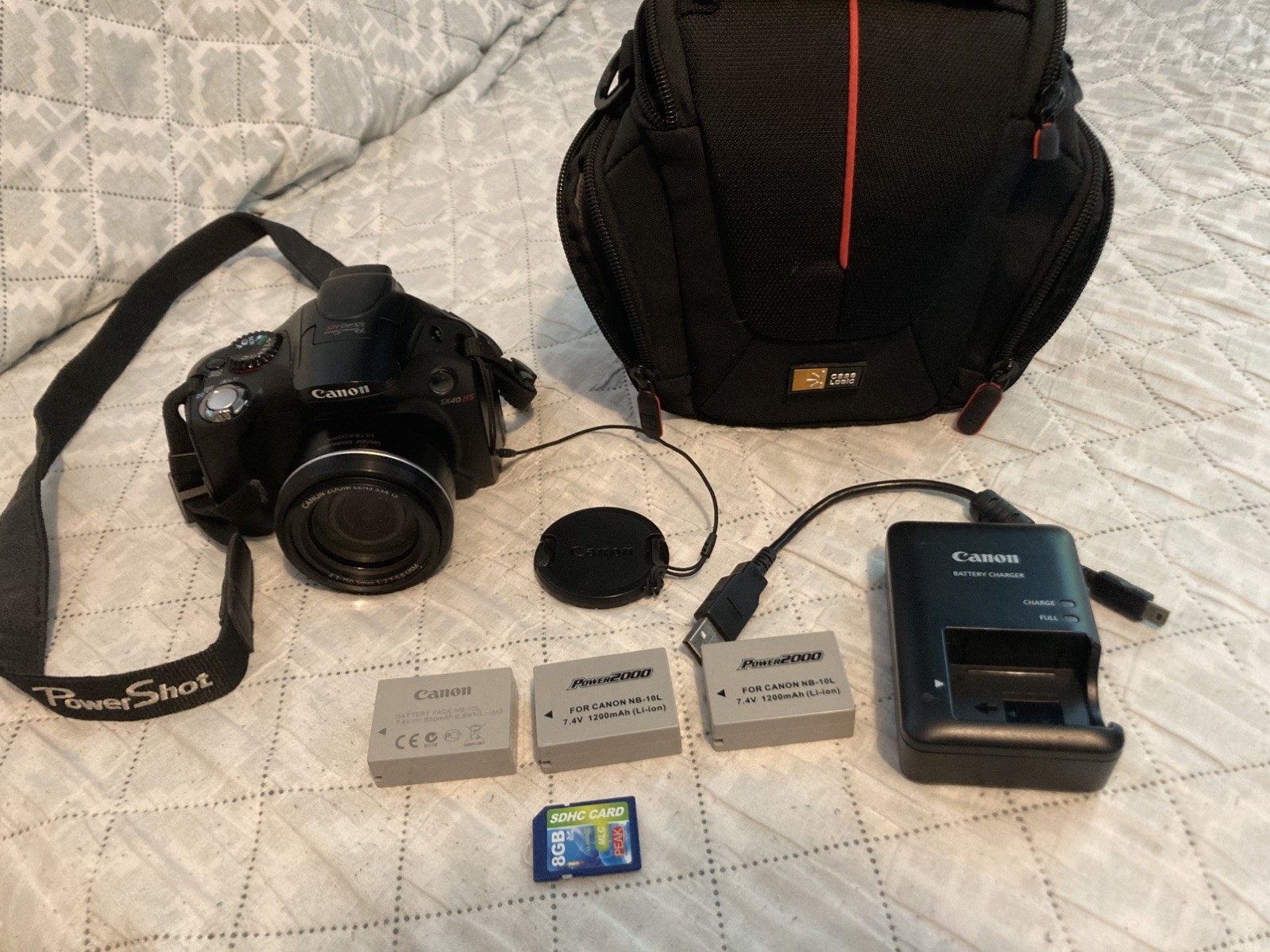 Canon Powershot SX40 HS 12.1 MP Digital Camera W/ SD Card Batteries Charger Bag