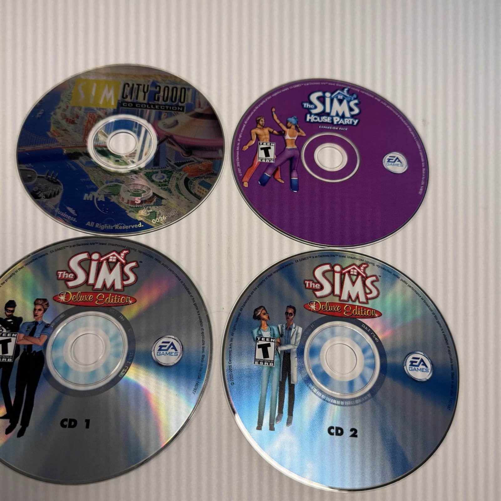 Vtg Bundle SIM PC Sim City 2000, Town, The Sims Deluxe Edition, Sims House Party
