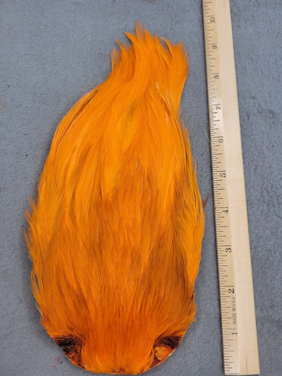 Lot 245,  Grade B,  DYED ORANGE India Rooster Streamer Neck Cape Feathers