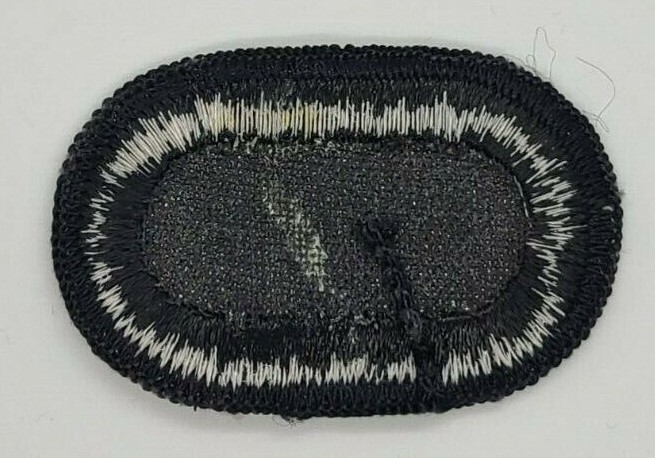 US ARMY SUBDUED AIRBORNE OVAL, MERROWED EDGE