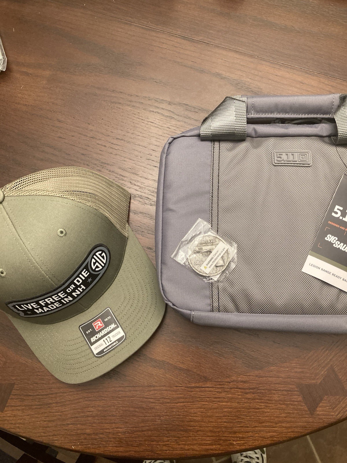 Sig Sauer Case, Coin And Hat Bundle.