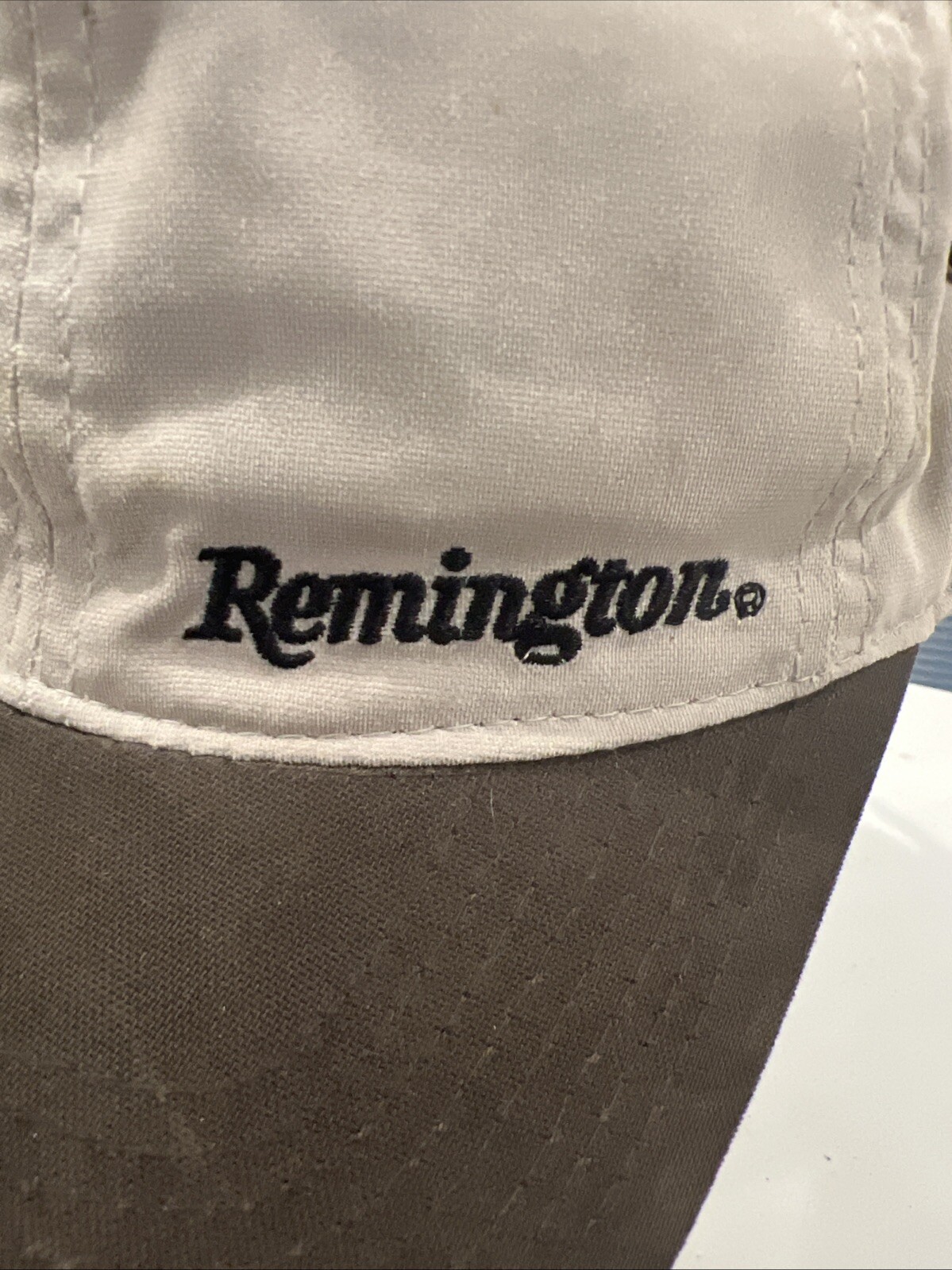 Remington Black Letters on Tan Fabric Hat Cap w Brown Bill Strap Buckle EUC
