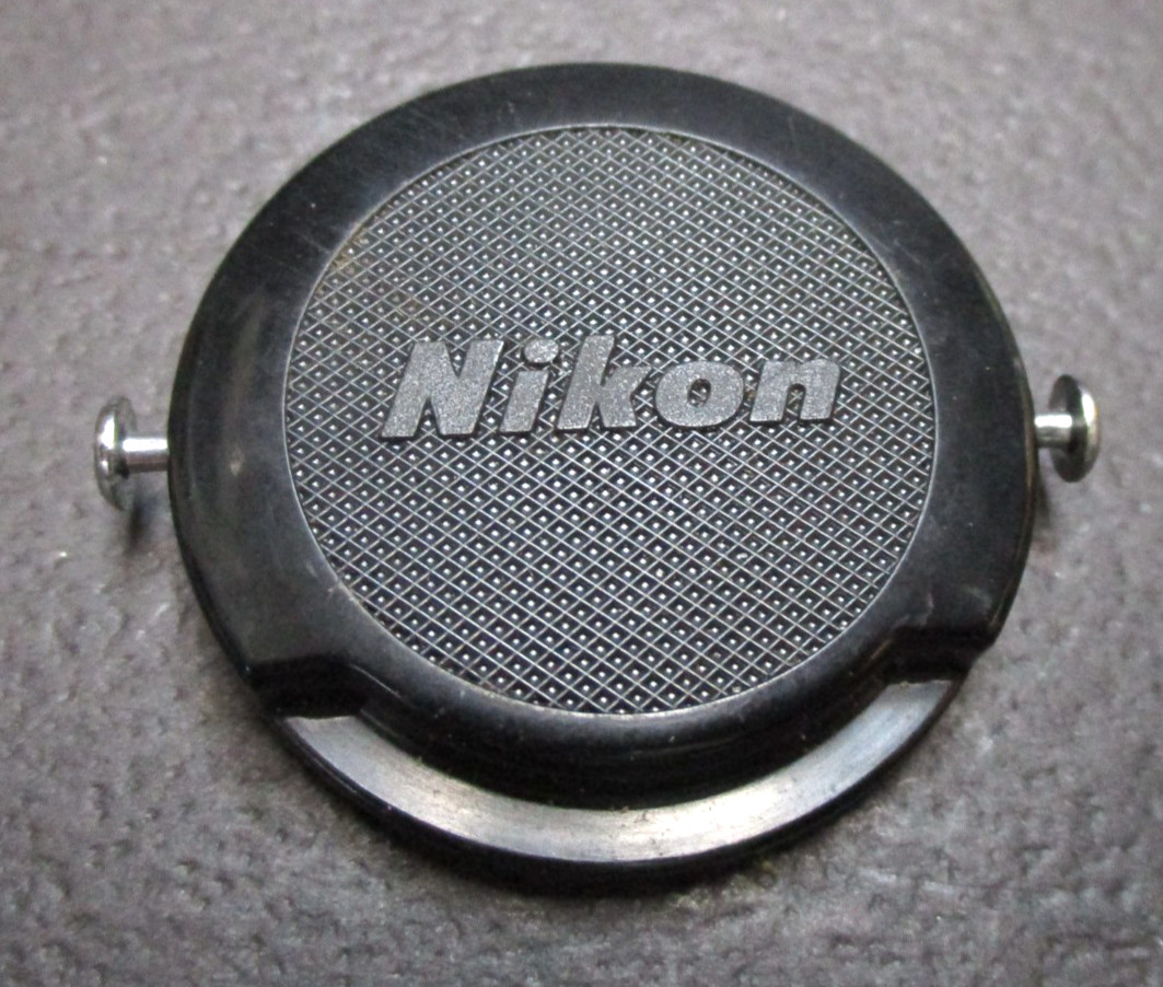 Nikon 34.5mm pinch on front lens cap.