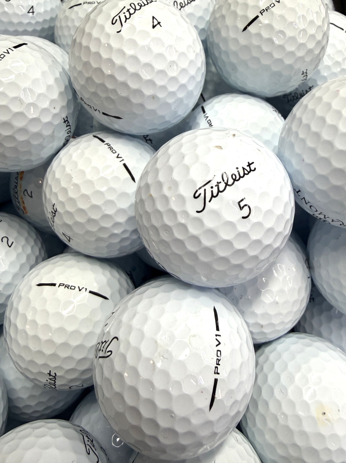 24 Near Mint AAAA Titleist Pro V1 2025 Used Golf Balls w/ Mesh Bag