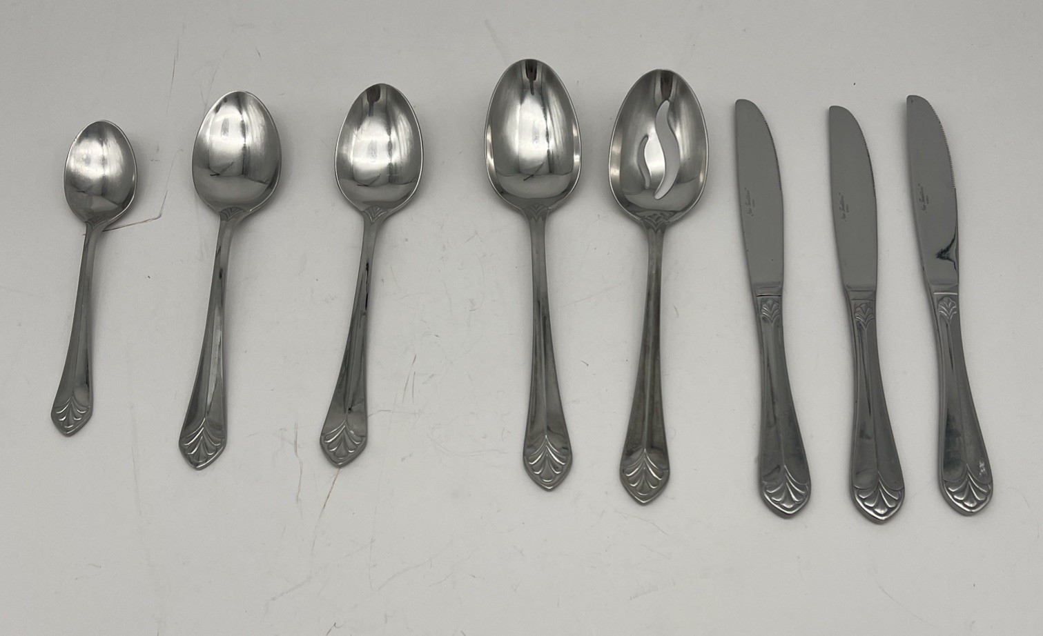 New Traditions Korea Stainless Silverware Replacement Spoons Knives Pierced 8pc