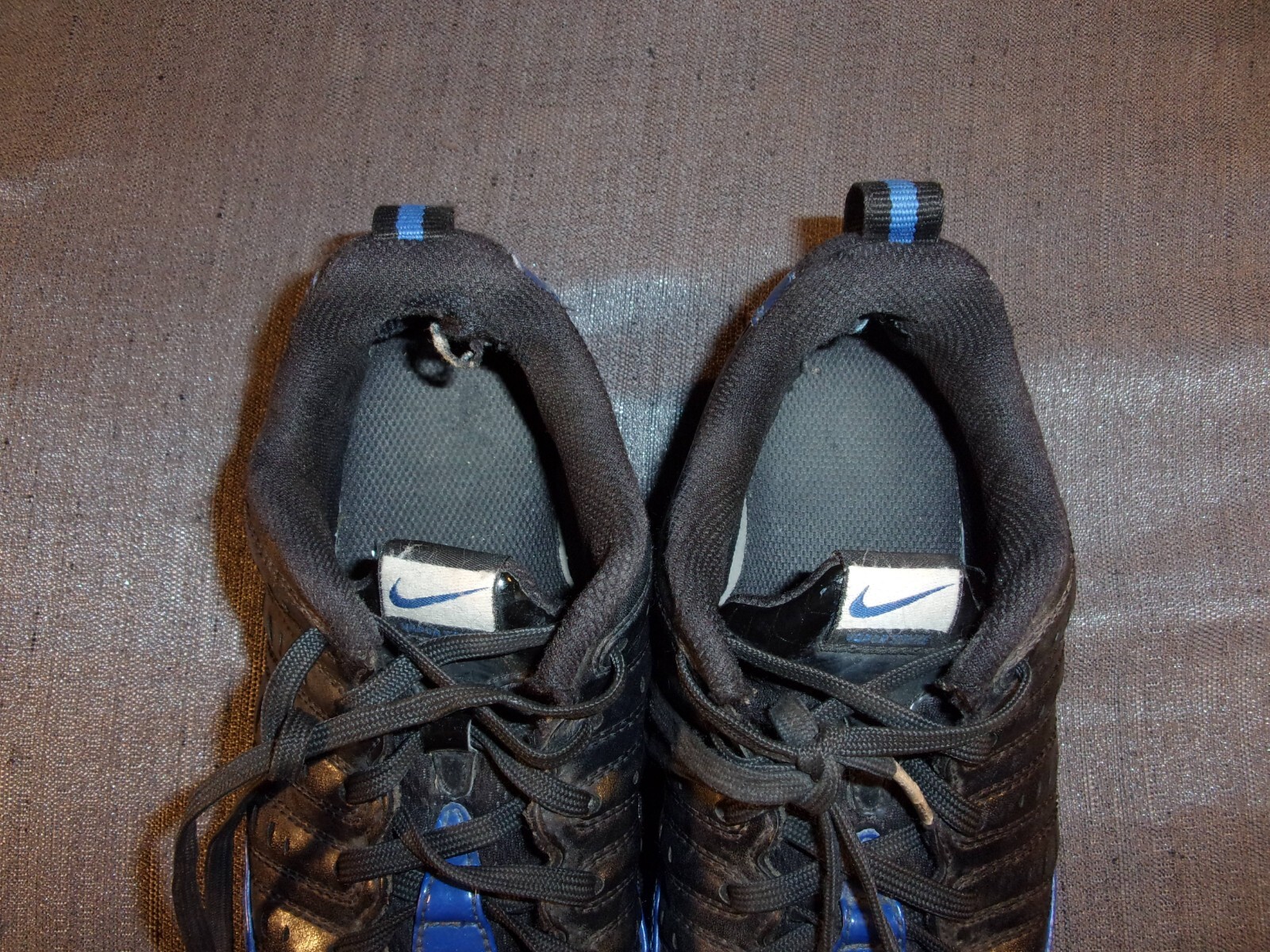 NIKE BLUE AND BLACK CHILDREN'S CLEATS 4.5 YOUTH