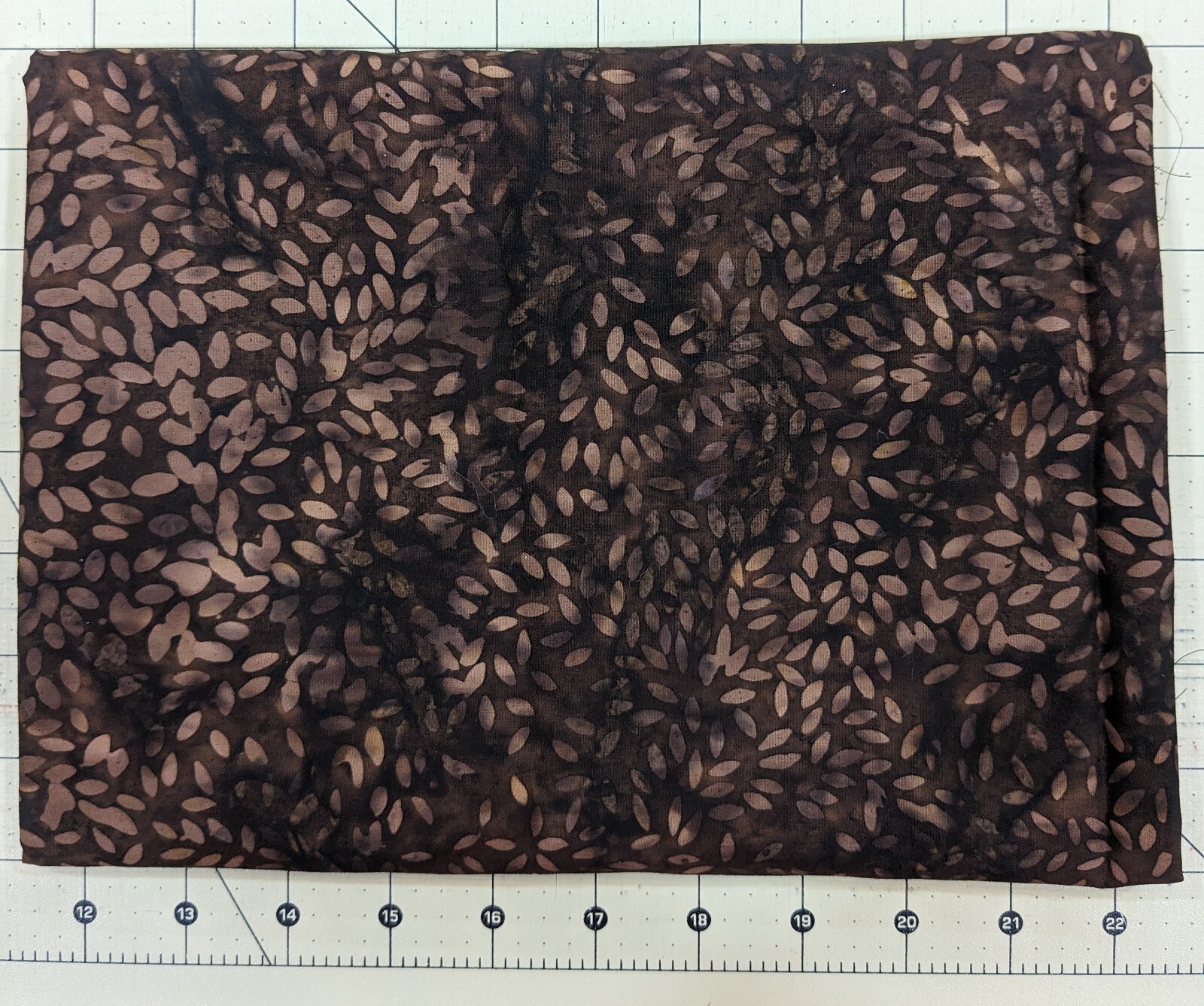 1 yard cotton BATIK quilting fabric - dark brown with medium brown leaf design