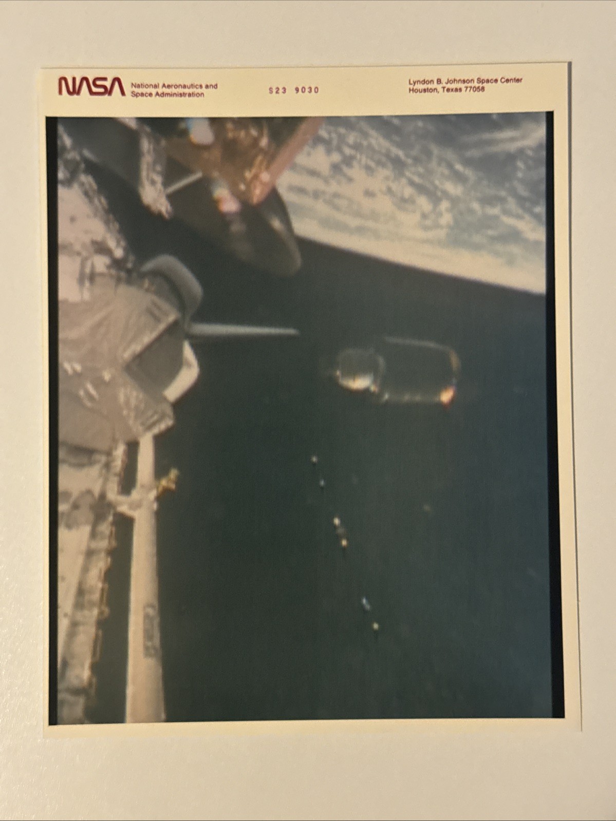 NASA STS 51 D Telesat I Separates from Discovery Spins and Rises Press Photo