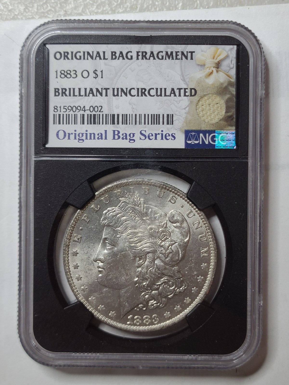 1883-O $1 MORGAN SILVER DOLLAR BU ORIGINAL BAG FRAGMENT