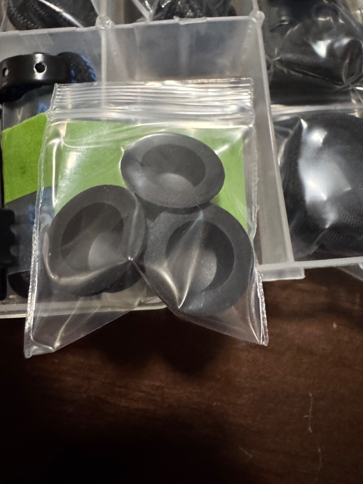 Flashlight Lanyards, O rings and an Olight Flashlight Charger