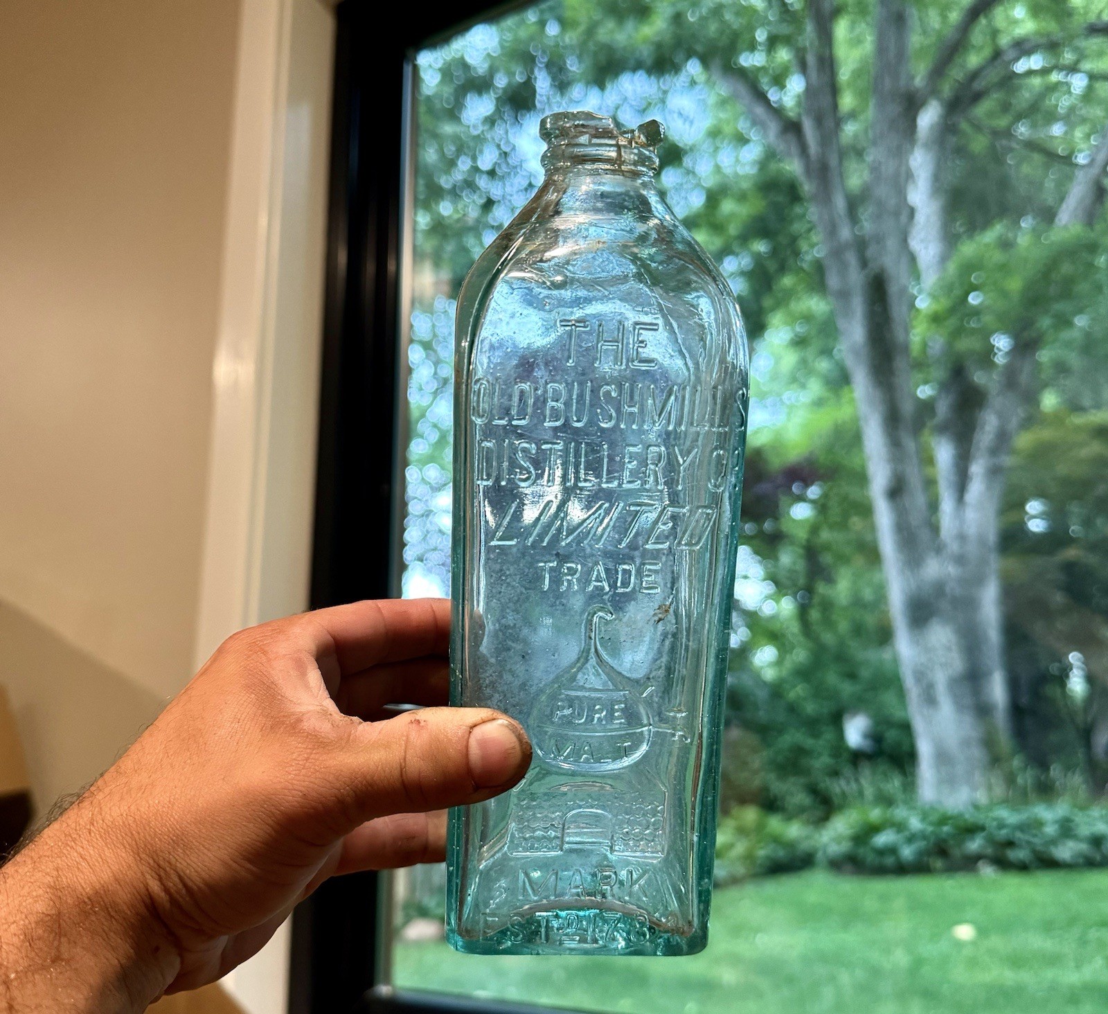 The Old Bushmills Distillery Co Emb Pictorial Antique Irish Whiskey Bottle 1910s